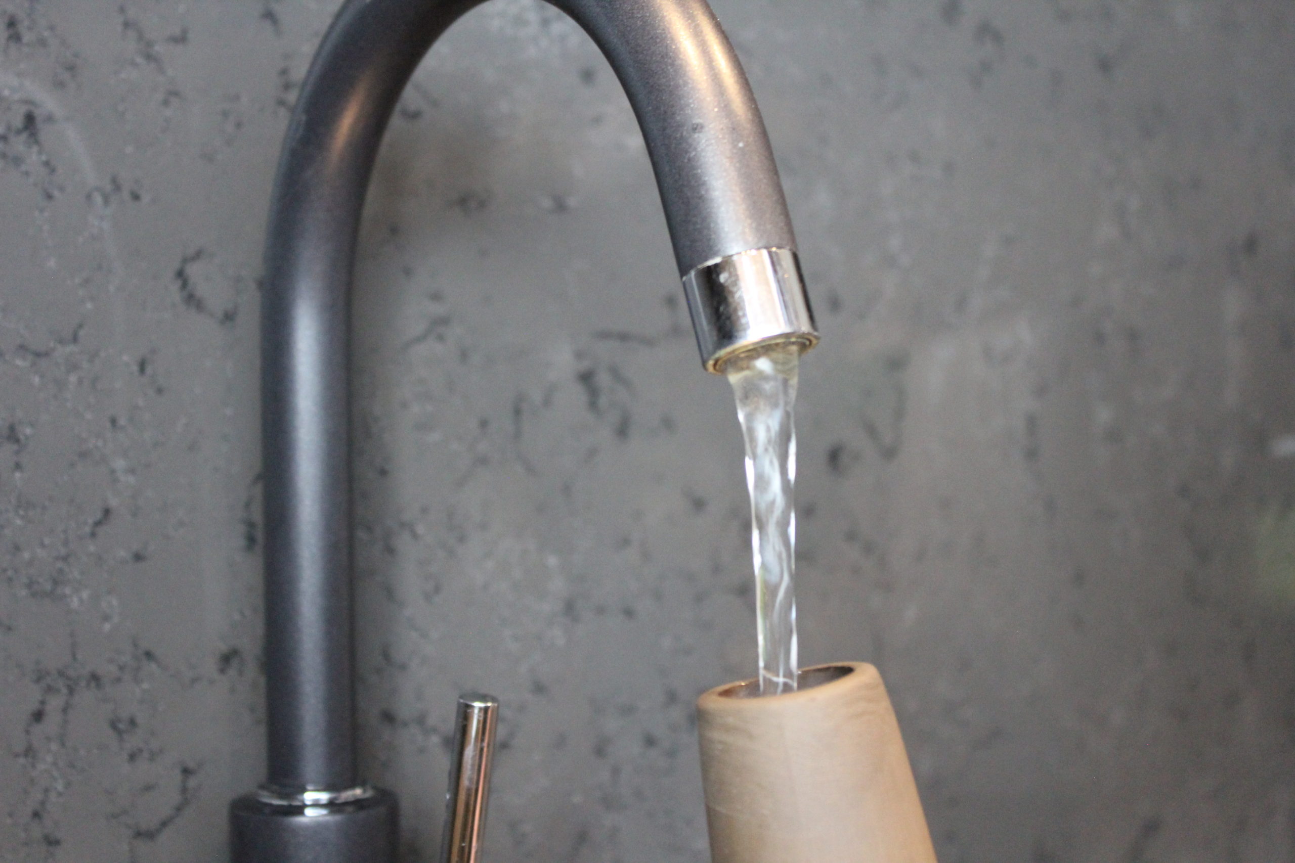 Image shows a Jarra carafe being filled with water.